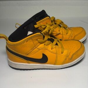 Nike Air Jordan 1 Mid sneakers in the "University Gold/Black size 10